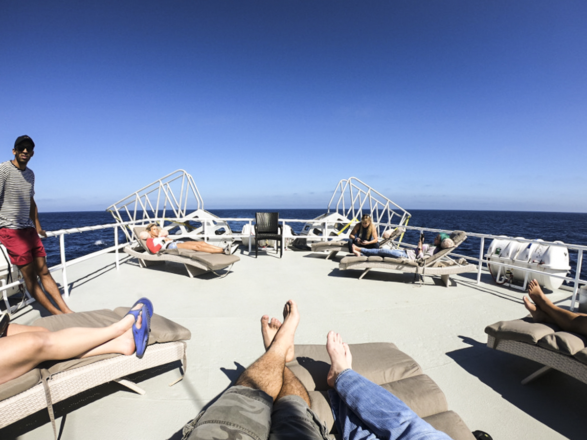 Guests warm up and relax on the sundeck